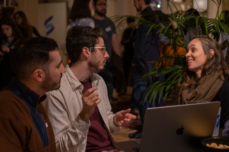 Speaker presenting at a UX Hub Barcelona meetup