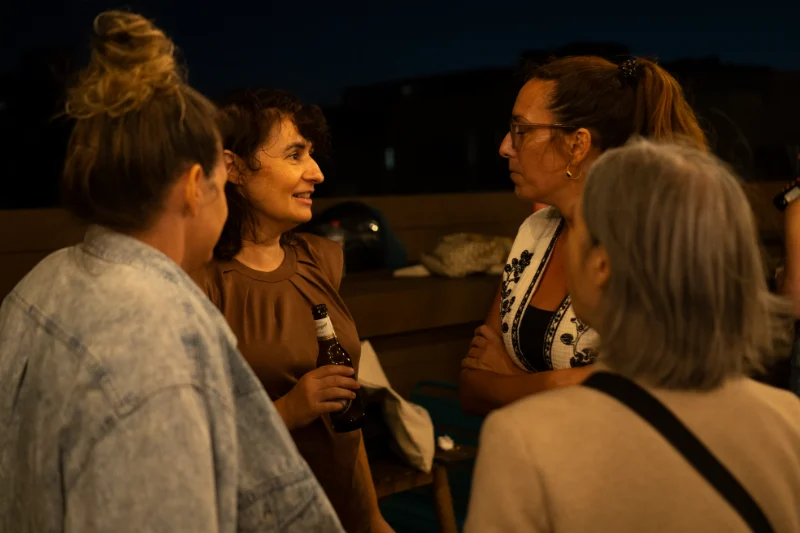 Small group conversation at a UX Hub Barcelona event