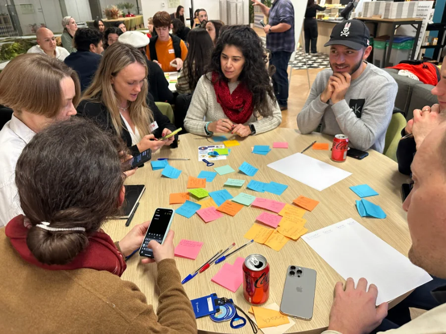 A UX Hub Barcelona meetup in a warm, lived-in venue